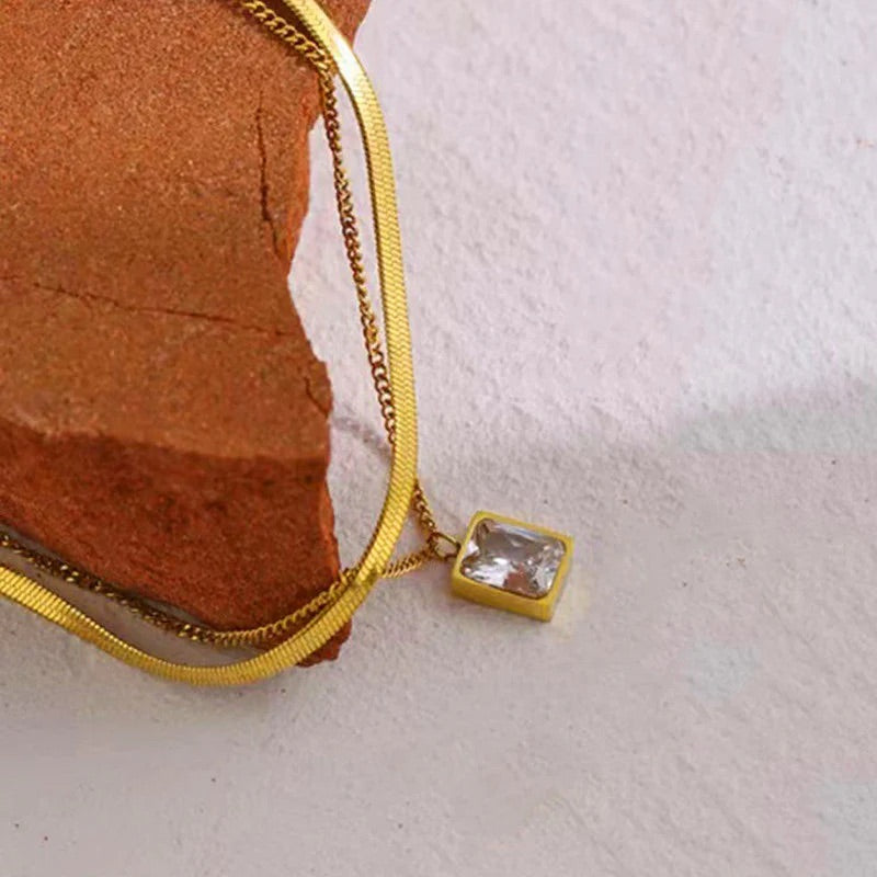 Luxora Dual-Layer Gold Necklace with White Crystal Pendant – Anti-Tarnish & Waterproof