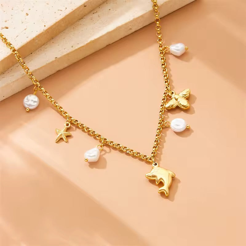 Oceanic Bloom: Anti-Tarnish Stainless Steel Dolphin, Starfish & Pearl Necklace - Summer Charm