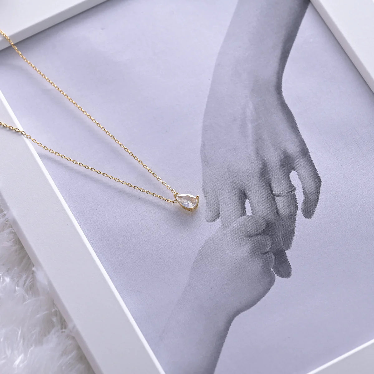 The Teardrop Glow Necklace
