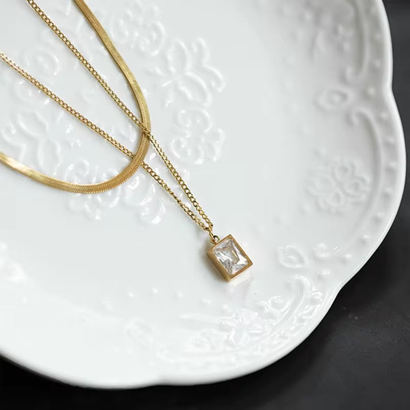 Luxora Dual-Layer Gold Necklace with White Crystal Pendant – Anti-Tarnish & Waterproof
