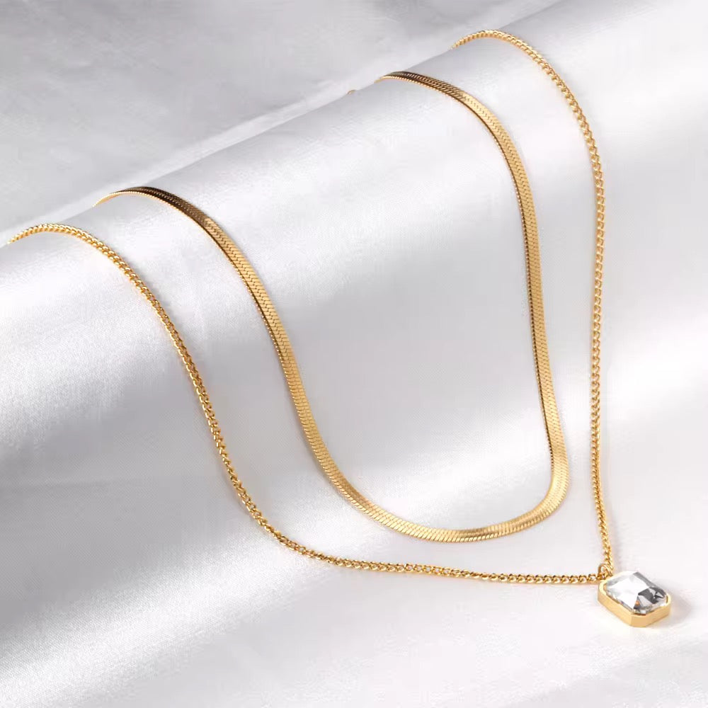 Luxora Dual-Layer Gold Necklace with White Crystal Pendant – Anti-Tarnish & Waterproof