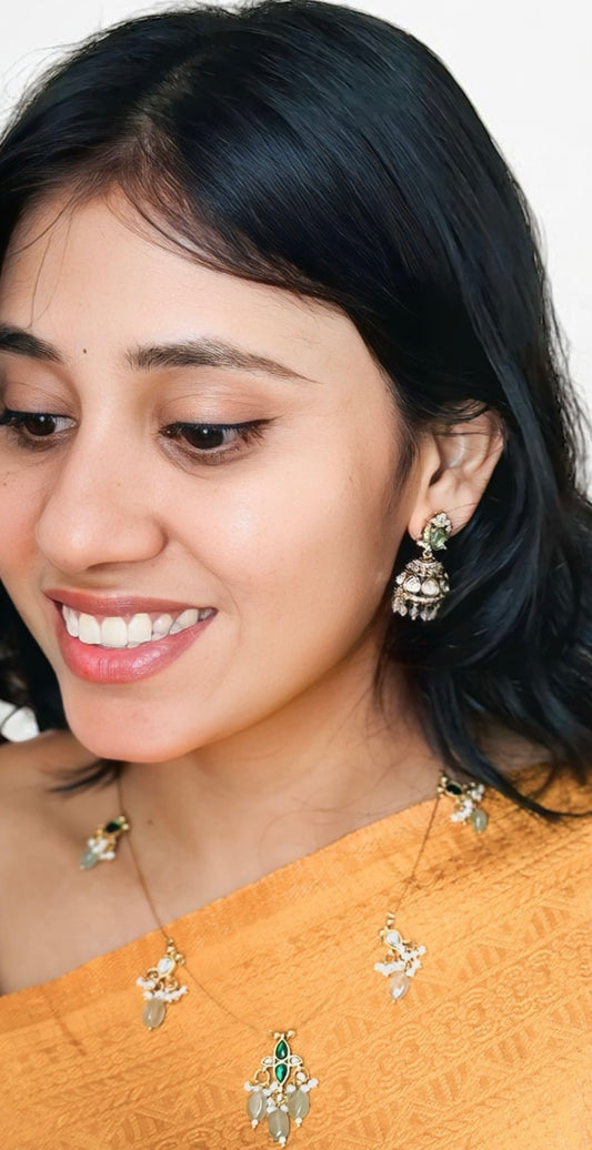 Victoria Collection: Antique Gold Jhumka Earrings with Green Stones