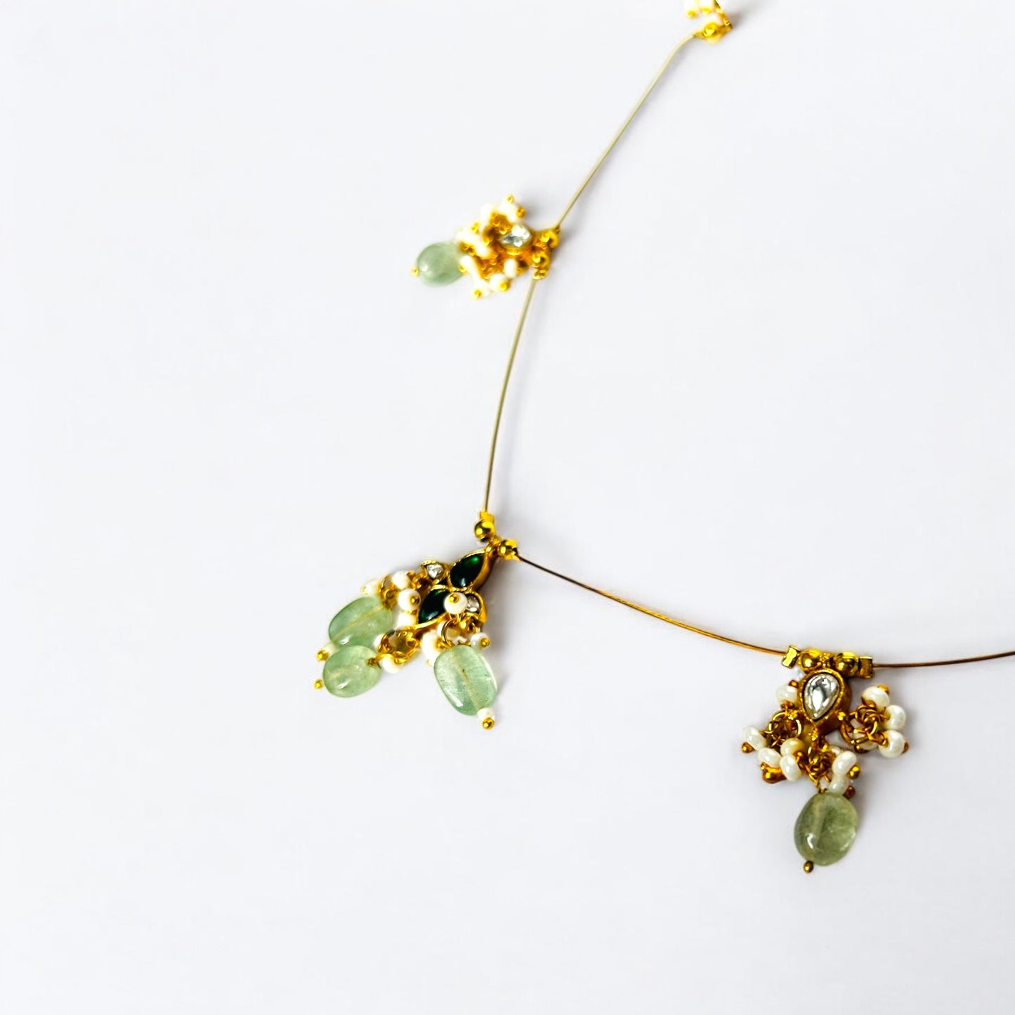 Delicate Gold Tone Invisible Victoria Chain with Green Gemstone