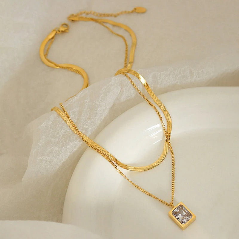 Luxora Dual-Layer Gold Necklace with White Crystal Pendant – Anti-Tarnish & Waterproof