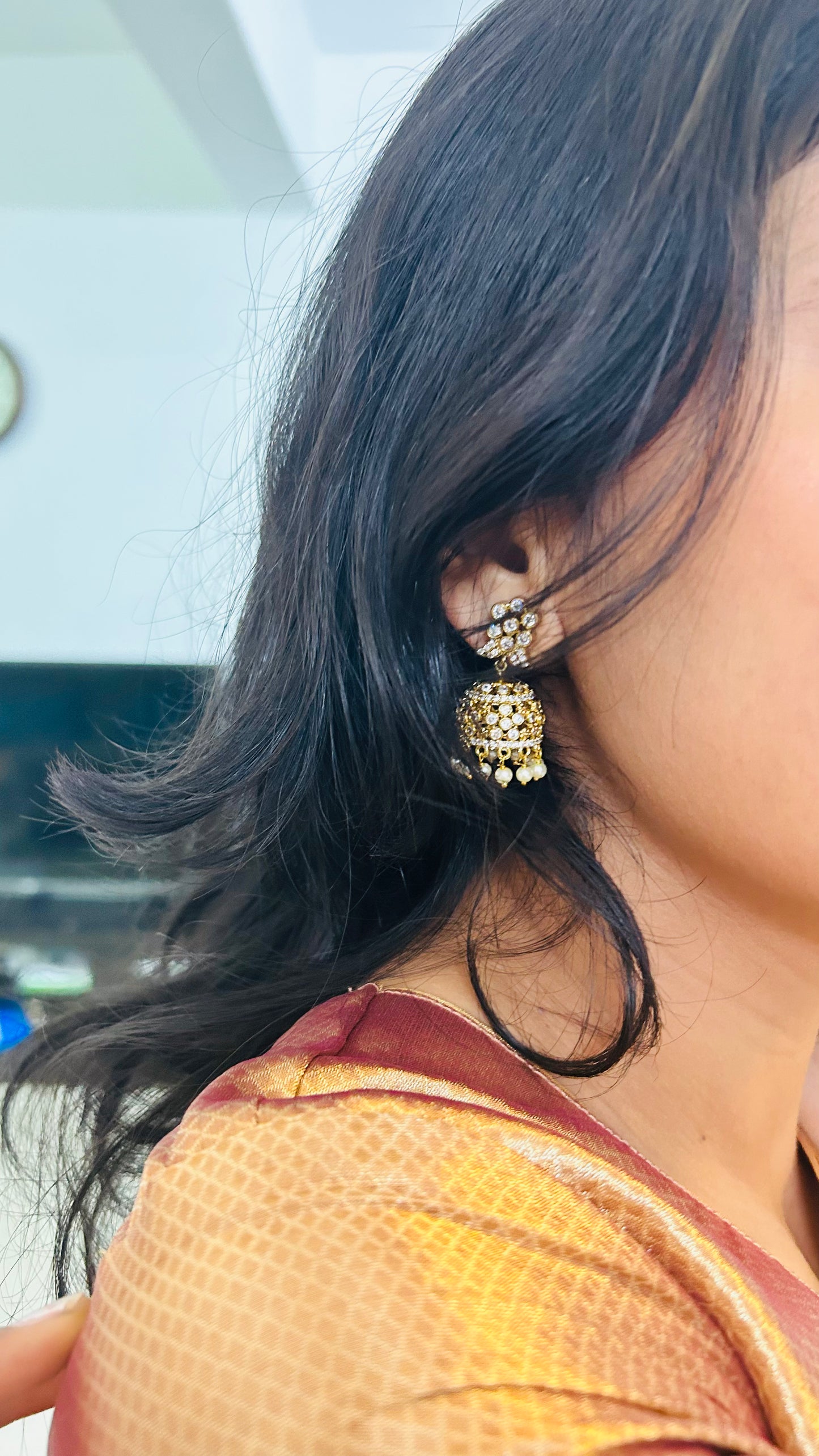 Vintage Elegance: Antique Gold Jhumka with Sparkling Stones and Pearls
