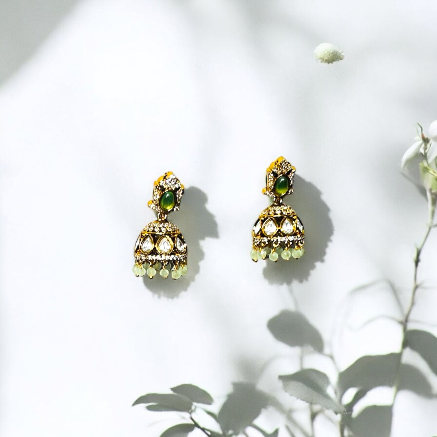 Victoria Collection: Antique Gold Jhumka Earrings with Green Stones